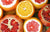 sliced oranges, pomegranates, and grapefruits 